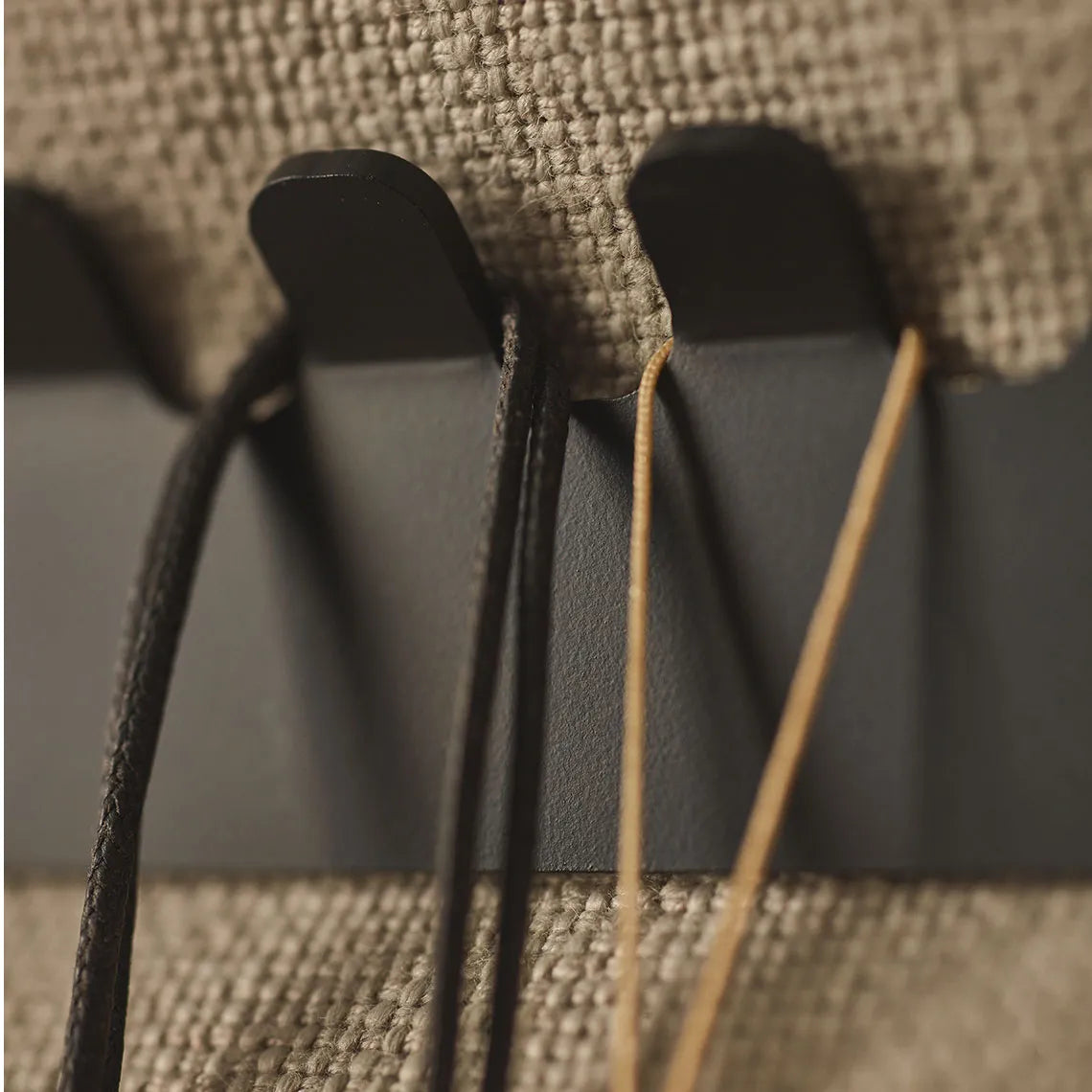 Padded Wall Boards Accessories - Decorative Strip 1 Black closeup on hooks Decormania UK